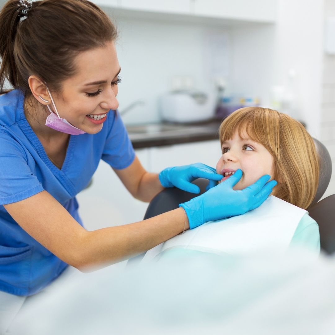 dental hygienist and young child